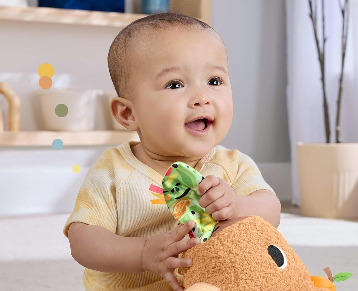 FISHER-PRICE plüss szenzoros kapibara rágókával és csörgővel 23,5 cm