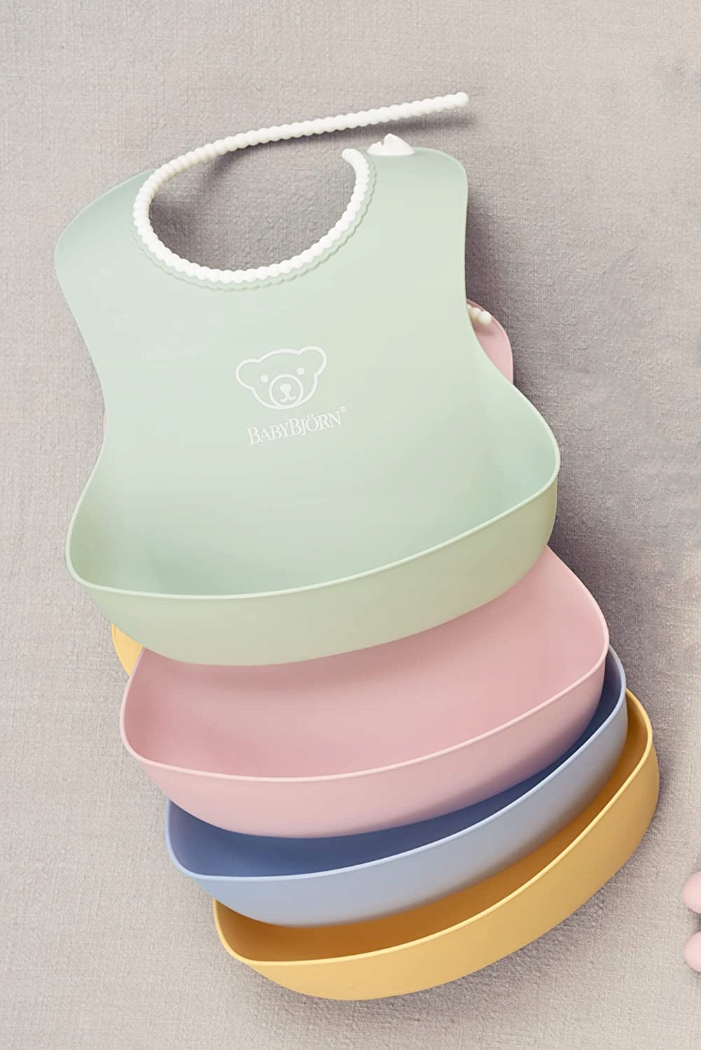 BABYBJORN bavetă din silicon cu buzunar x2
