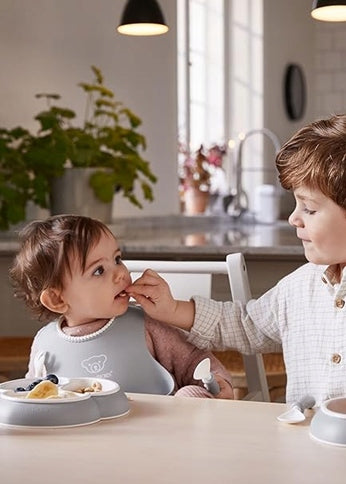 BABYBJORN bavetă din silicon cu buzunar x2