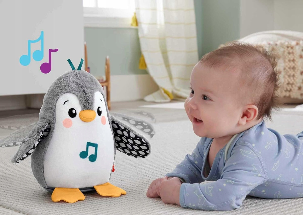 FISHER-PRICE HNC10 Wipp-Pinguin mit Melodien 21 cm