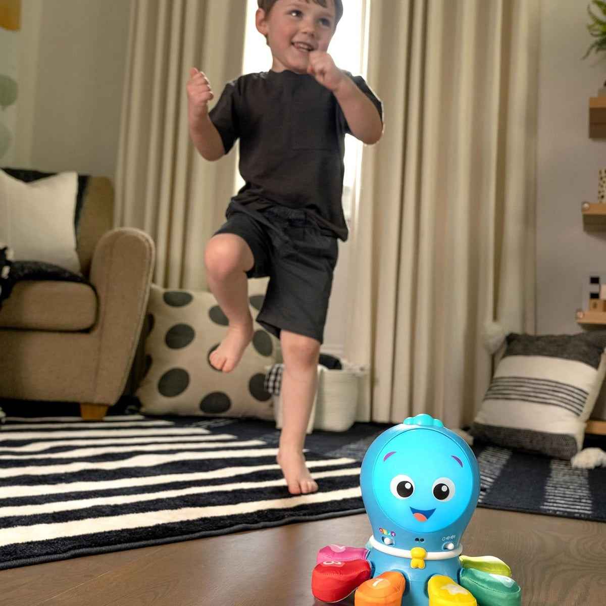 BABY EINSTEIN interaktywna OŚMIORNICA frazy melodie światła ruch 4 języki