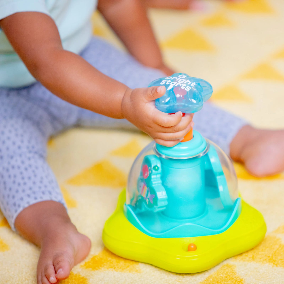Bright Starts Press Glow Spinner zabawka muzyczna 6m+