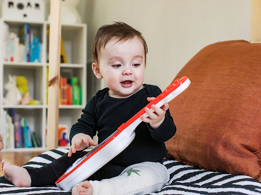 HAPE Baby Einstein ukelele de madera y plástico 43 cm