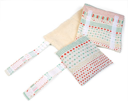 GRUNSPECHT hot water bottle with grape seeds + holding belt