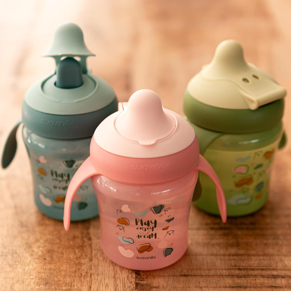 SUAVINEX Learning Cup cană de învățare anti-picurare cu gură rigidă 200 ml 6 luni+