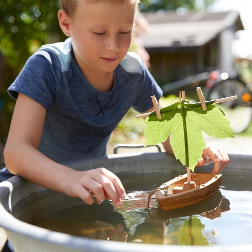 HABA Terra Kids barcă din plută și elemente din lemn 22 cm 8 ani+