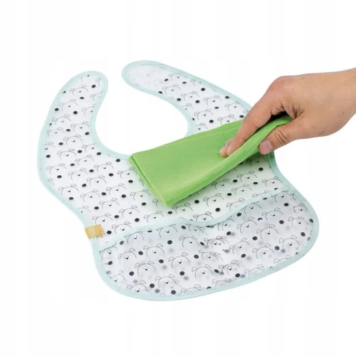 LASSIG bavetă din plastic cu scai și buzunar 6-24 luni