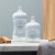 PHILIPS AVENT Natural Response set 4 biberoane suzetă perie