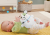 FISHER-PRICE Snuga Puppy jucărie de pluș cu melodii și vibrații CĂȚELUȘ 18 cm